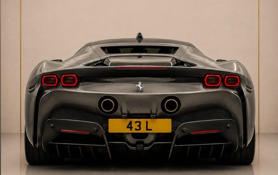 Grey Ferrari SF90 with private registration 43 L