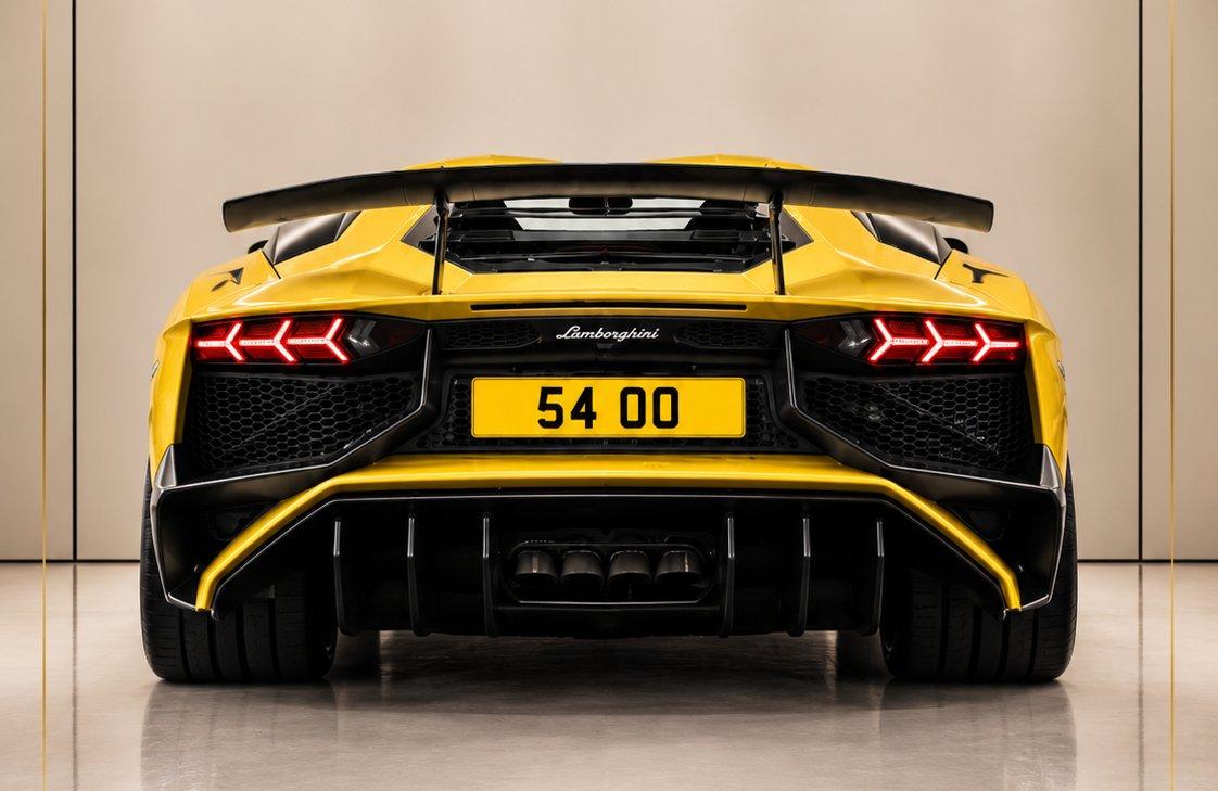 Yellow Lamborghini Aventador SV with private registration 54 OO